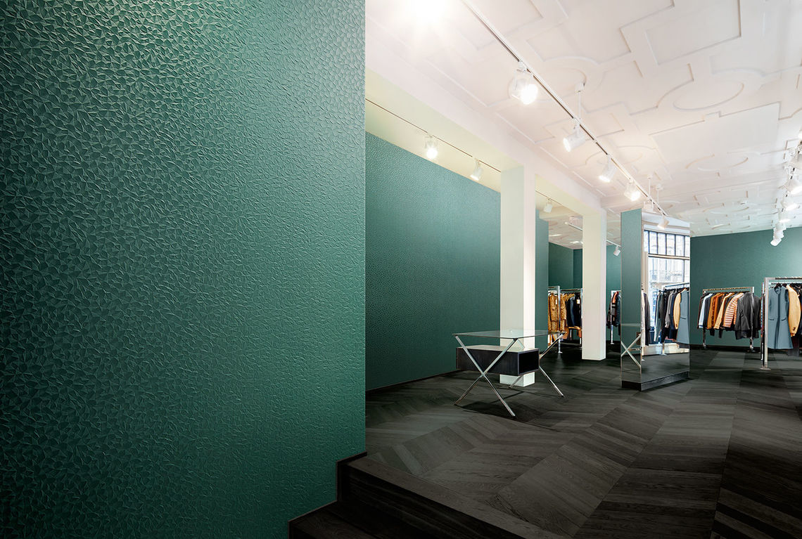 Wallcovering design Aikin adds a warm finish to high-end retail spaces, and stands up to heavy-duty use