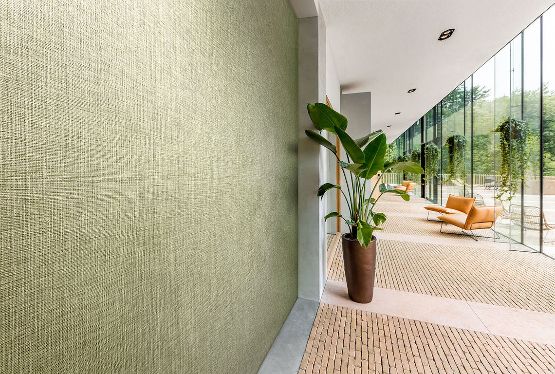 Vinyl wallcovering design Greenbo features soft, organic forms inspired by nature
