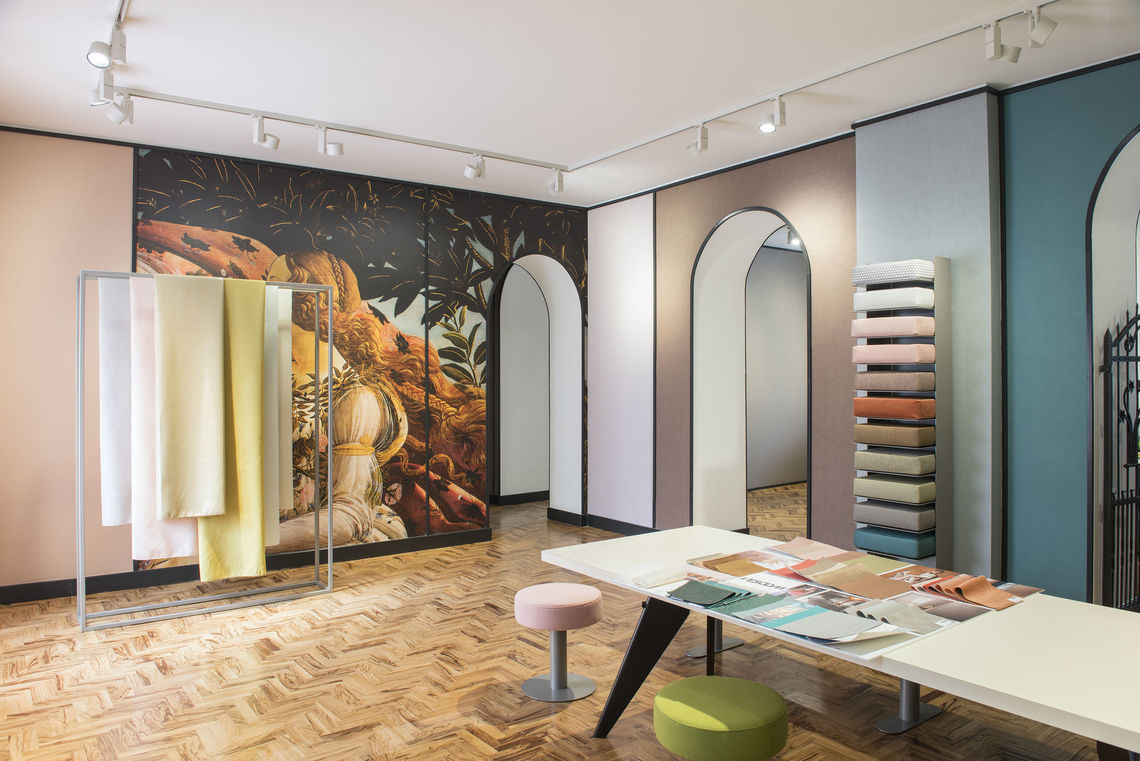 An artwork has been printed on vinyl for one wall of this Vescom showroom in Milan
