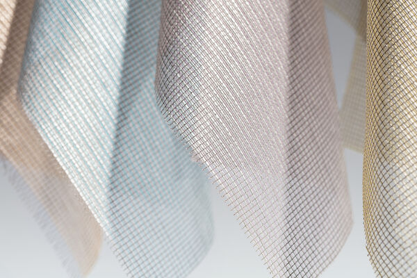 Close up of transparant curtain fabric in various colours