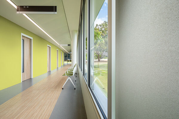green and gray vinyl wallcovering in a hospital