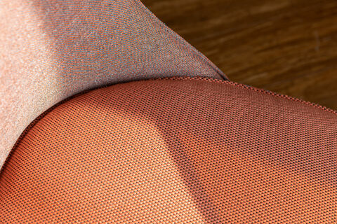 close up of a chair upholstered with 2 different fabrics