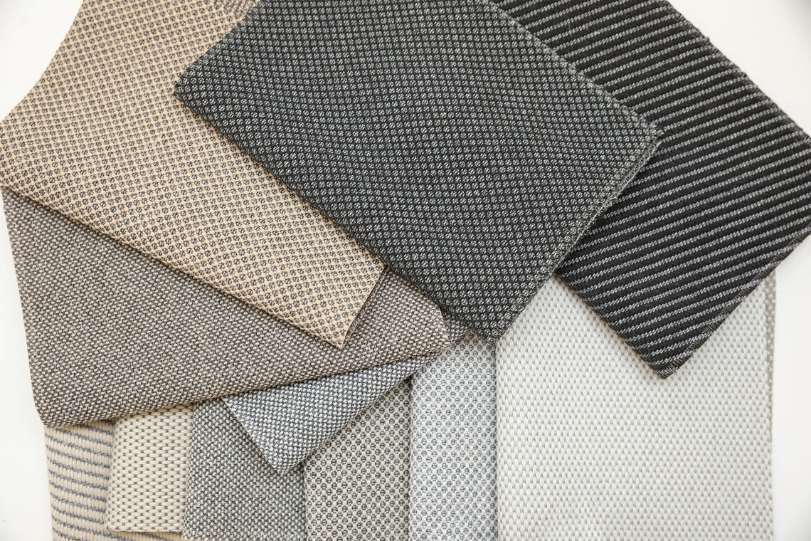 different structured upholstery samples in neutral colours 