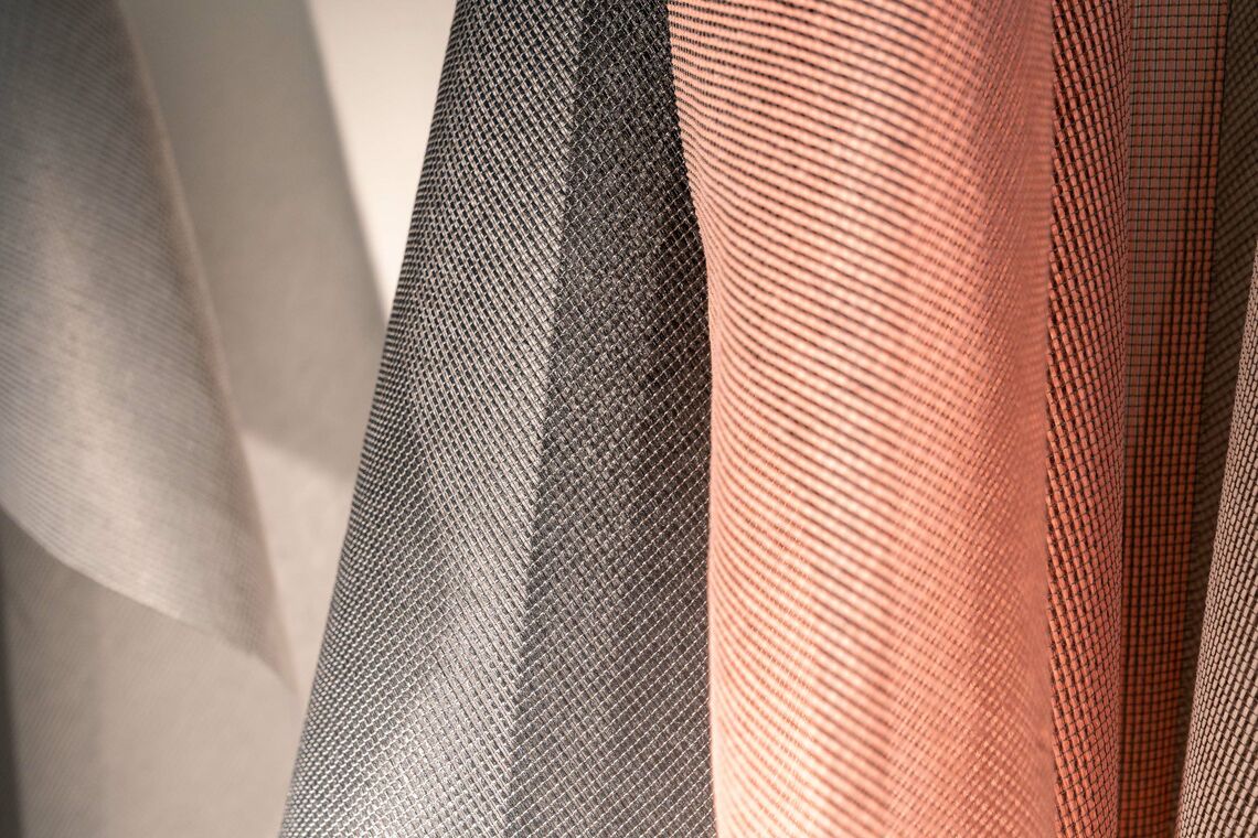 Close up of various colours transparent curtain fabric Nias